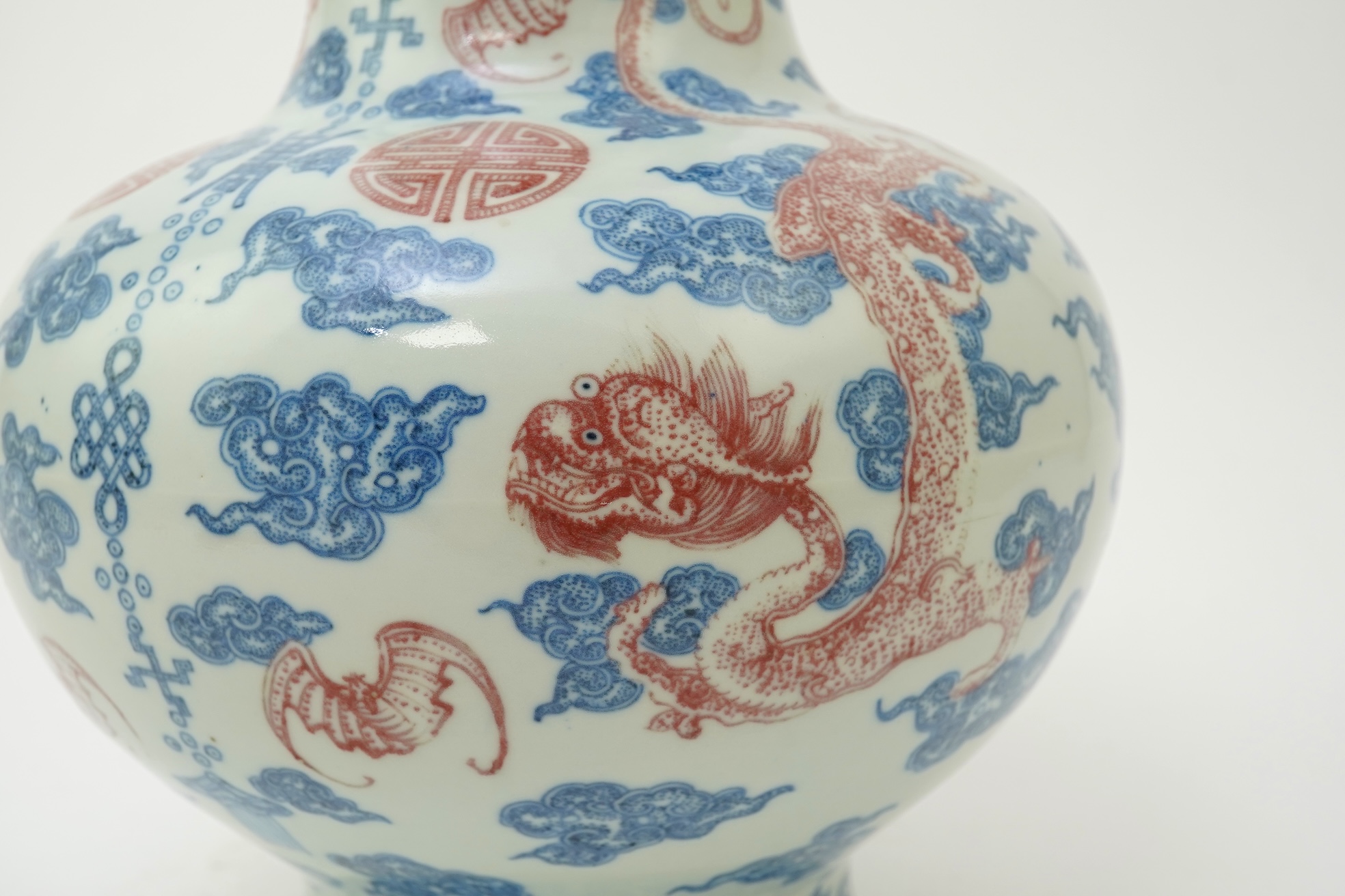 A Chinese underglaze blue and copper red ‘dragon’ vase, Qianlong seal mark but early 20th century